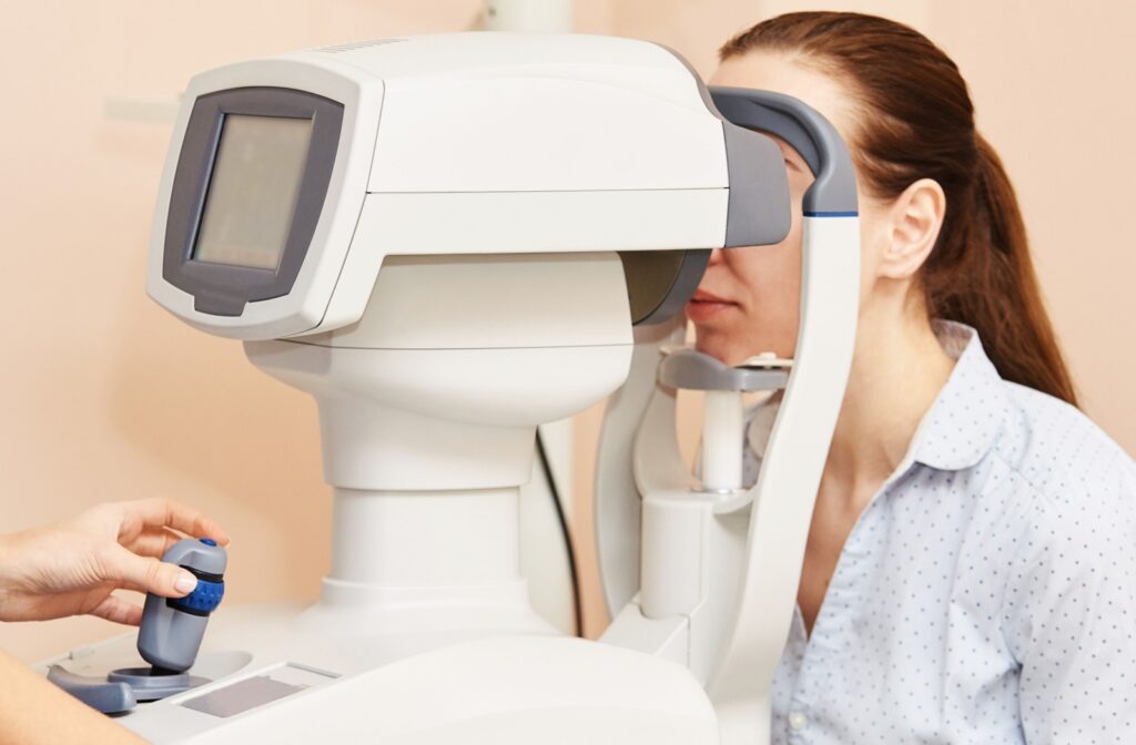 An optometrist takes their patient's OCT scans.